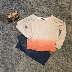 Gray and pink ombré off the shoulder sweater.